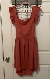 BRAND NEW Apron Style Dress with Ruffle Sleeves and Tie Bow Open Back Size L Pink Size L Photo 0