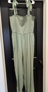 Regina Stitched Top Bow Tie Shoulder Strap Jumpsuit Photo 0