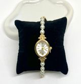 Dainty Gold Pearl Watch Photo 0