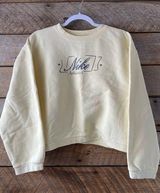 Vintage Nike Womens Large Spell Out Script Cropped Crewneck Sweatshirt Yellow Photo 0