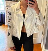 Urban Retro WHITE FAUX LEATHER FLORAL SLEEVE JACKET Photo 0