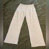 PINK beige colored flare sweatpants Photo 0