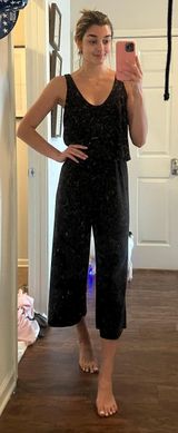 black jumpsuit Photo 0