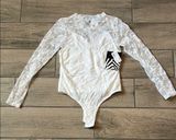 Soho Apparel White Lace Long Sleeve Bodysuit Photo 0
