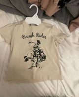 Brandy Melville rough riders baby tee Photo 0