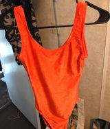orange bodysuit Photo 0