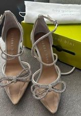 : Bridal Collection Ezlynn Rhinestone Embellished Bow Vinyl Toe Pump Photo 0