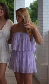 Exlura Romper Photo 0