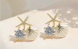 Gold and White Starfish Shell Earrings Photo 0