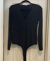 BCBGeneration black bodysuit with sheer side panels Photo 0