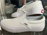 Vans White Slip-ons Photo 0