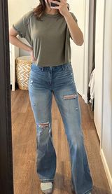 Ripped Flare Jeans Photo 0
