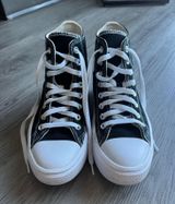 Black and White Platform High-Top Converse Photo 0