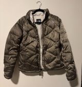 The North Face Puffer Jacket Photo 0