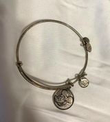 ALEX AND ANI Photo 0