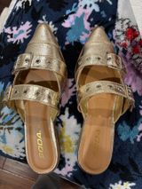 Gold Pointed Toe Slip On Shoes Photo 0