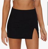Black Wrotorea mini skirt. Comfy and stretchy. #miniskirt Worn once to try on. Photo 0