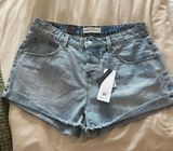 Mid-Rise Denim Shorts Photo 0