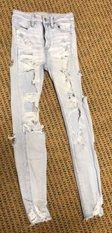 American Eagle Outfitters ripped jeans Photo 0