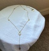 White House Black Market: Gold Tone Long Necklace- drapes Photo 0