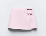 Pink Mini Skirt with Bow Accents Photo 0