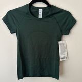 Swiftly Tech Short Sleeve Shirt 2.0 Waist Length Photo 0