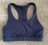 Lululemon Athletic Invigorate Racerback Sports Bra color- Navy. Size 2 Photo 0