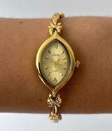 Dainty Bow Gold Watch Photo 0
