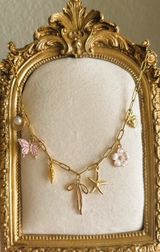 Beach Inspired Pink And Gold Plated Charm Necklace Photo 0