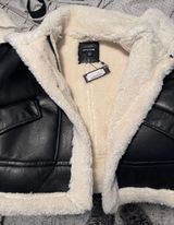 BLACK FAUX FUR LINED FAUX LEATHER BUCKLED AVIATOR JACKET Photo 0