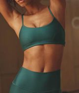 Alo Yoga Airlift Intrigue Bra in Green Winter Ivy Photo 0