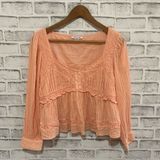 Women’s Outfitters peach colored textured long sleeve v-neck top Photo 0