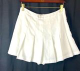 Cotton Candy LA white pleated skirt with attached shorts underneath size medium Photo 0