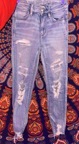 American Eagle Outfitters ripped jeans  Photo 0