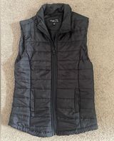 Rue 21  black puffer vest size small Photo 0