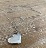 Tiffany & Co. TIFFANY STERLING SILVER SOLID HEART PENDANT Photo 0