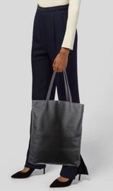 Saks 5th Avenue Saks Fifth Avenue faux leather perforated accent tote bag Photo 0