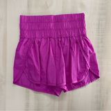FREE PEOPLE MOVEMENT the way home smocked shorts workout pink M travel Photo 0