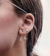 Boutique Eye Cross Stud Set Photo 0