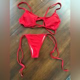 NWOT Red Bikini with Cage Details and Side Tie Bottoms Photo 0