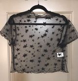 by the way. See Through Star Top Photo 0