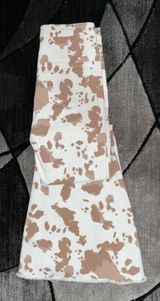 Buckle Cow Print Jeans Photo 0