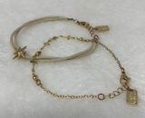 American Eagle 2 bracelets gold tone crosses and fabric cord north star charm Photo 0