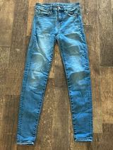 American Eagle, next level stretch mid wash, high-rise, skinny jeans Photo 0