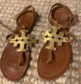Gold And Tan Sandals Photo 0