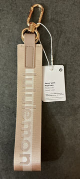 Lululemon  Athletica Beige never lost Keychain Photo 0