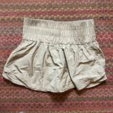 FREE PEOPLE MOVEMENT TAN SKORT Photo 0