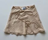 Princess  Polly Saturday Night V Waist Mini Skirt with Tie Detail in Beige Photo 0