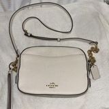 CROSSBODY LEATHER IS OFF WHITE/BONE COLOR GOLD HARDWARE ZIP CLOSURE ON TOP Photo 0