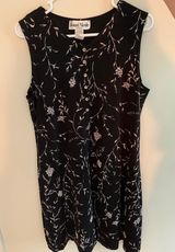 Ronni Nicole Black Dress Photo 0